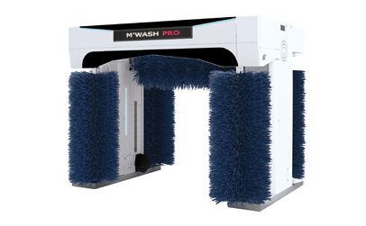 A black SUV is being sprayed with blue water jets inside an automated car wash bay.